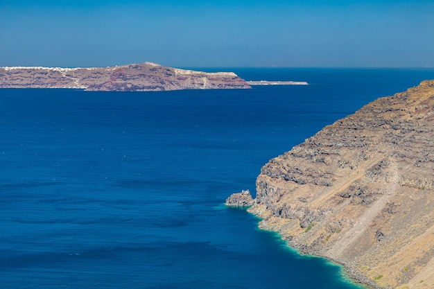 Panoramic view of the Santorini caldera cliffs from Imerovigli village on Santorini island Greece