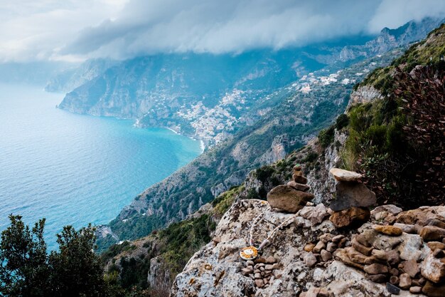 Panoramic view of sea and mountains against sky