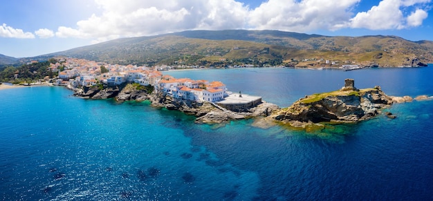 Panoramic view of sea and mountains against sky