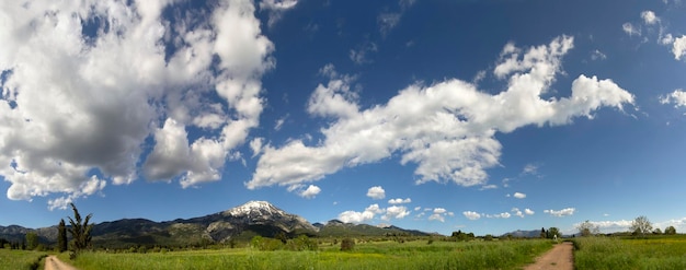 Panoramic view of snow covered mountain Dirfys and sky with clouds on on the island of Evia Greece