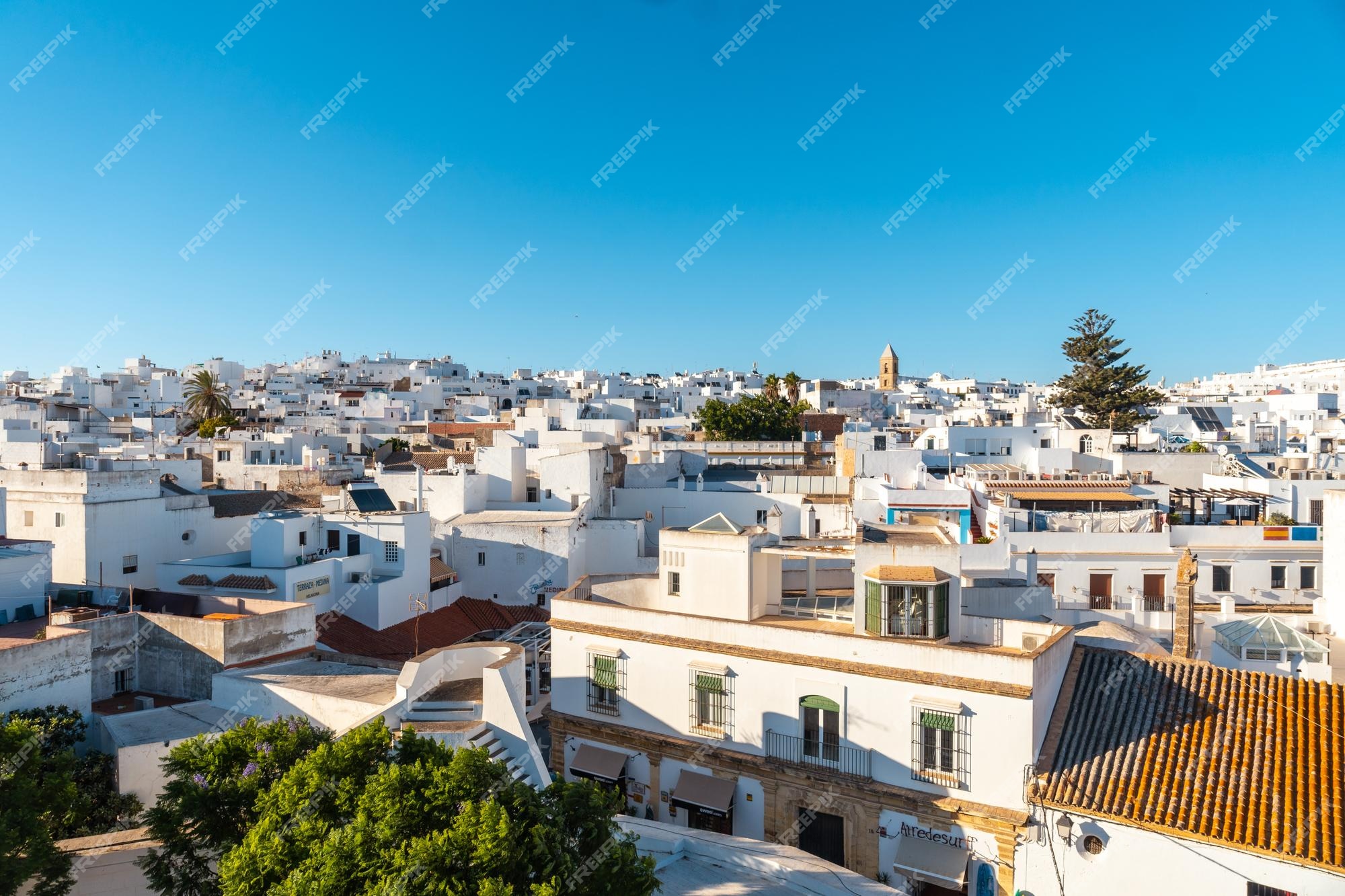 Premium Photo  Aerial view of the town of conil de la frontera from the  torre de guzman cadiz andalusia