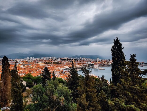 Panoramic view of townscape against sky in city