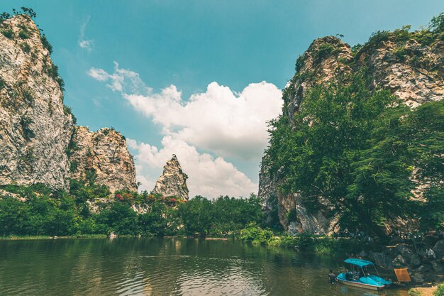 Panoramic view of trees and rocks against sky