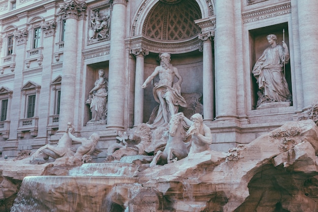 Panoramic view of Trevi Fountain in the Trevi district in Rome, Italy. It designed by Italian architect Nicola Salvi and completed by Giuseppe Pannini