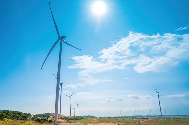 Panoramic view of wind farm or wind park with high wind turbines for generation electricity with copy space at Phan Thiet Mui Ne Bau Trang Green energy concept