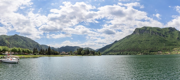 Panoramic view of the wooded Alps and the highest Lombard Lake Idro Lago d'Idro