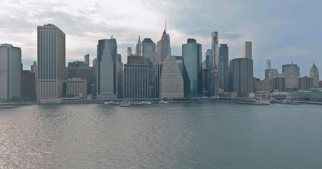 Panoramic view on yacht transporting passengers on hudson river new york manhattan usa of across bro