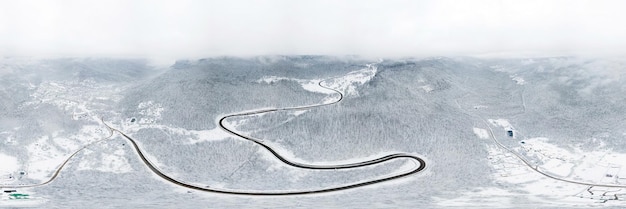 Panoramic winter landscape aerial caucasus forest panoramic background snow trees rural highway road