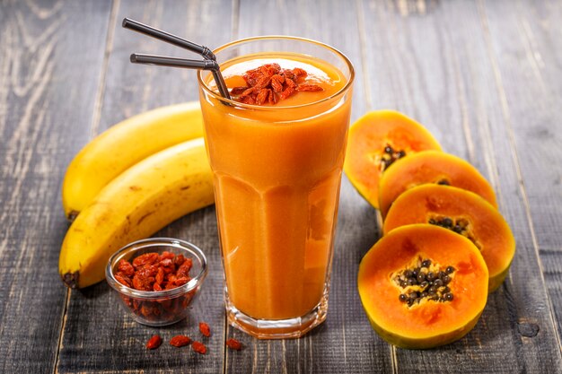 Papaya and banana smoothie in a glass