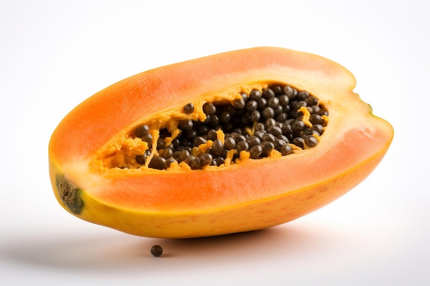 A papaya cut in half with seeds on it