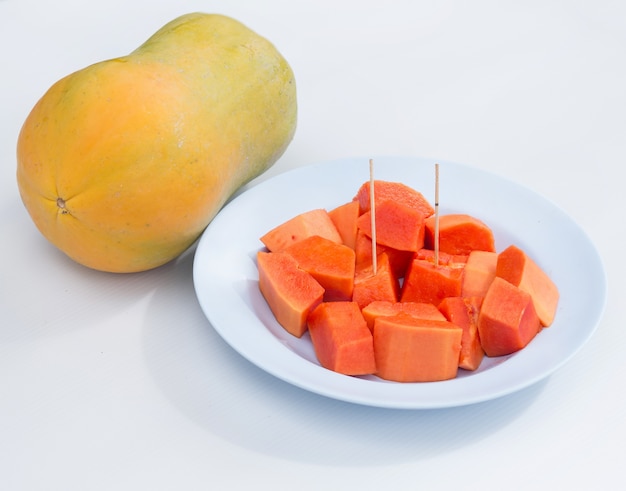 Papaya fruit in dish