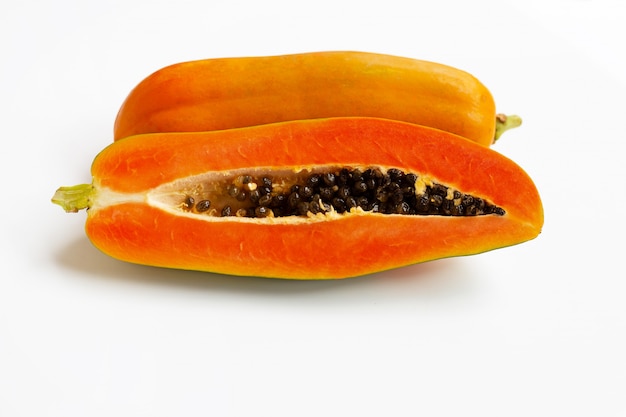 Papaya fruit on white.