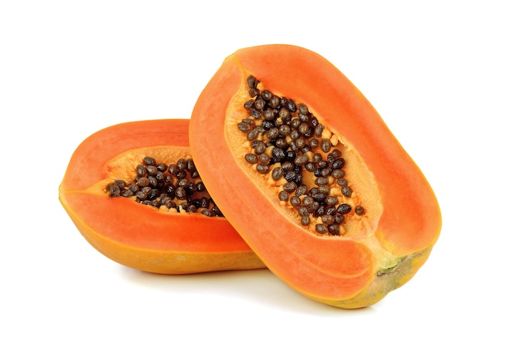 Photo papaya fruit with seeds isolated on white isolated