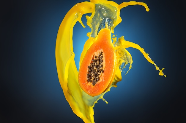 Papaya juice splash on a blue background.