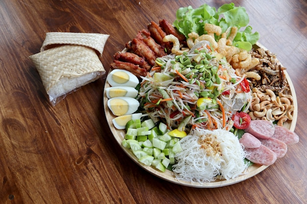 Papaya salad or Som Tum in thai foods, mixed with fresh shrimp.