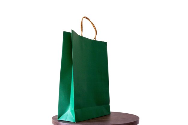 Photo paper bag on table against white background