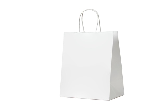 Paper bag on white background with copy space Ecofriendly white craft bag isolated