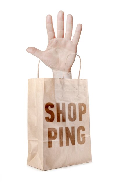 Paper bag with a hand and word shopping