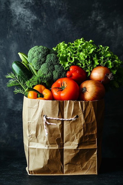 Paper bags filled with vegetables and fruit