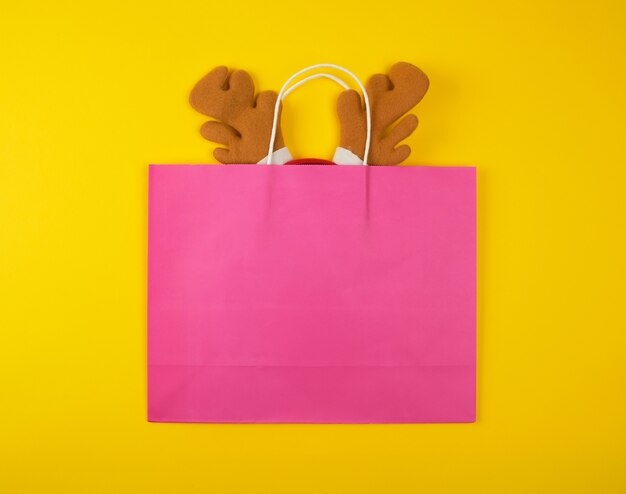 Paper bags for shopping with deer headband inside