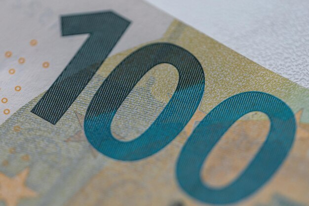 Paper bill of 100 euros macro Business and finance concept 100 euros money