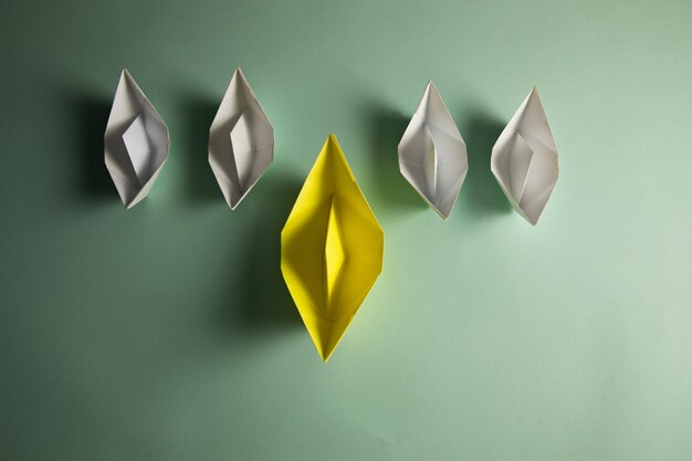 Paper boats on the table