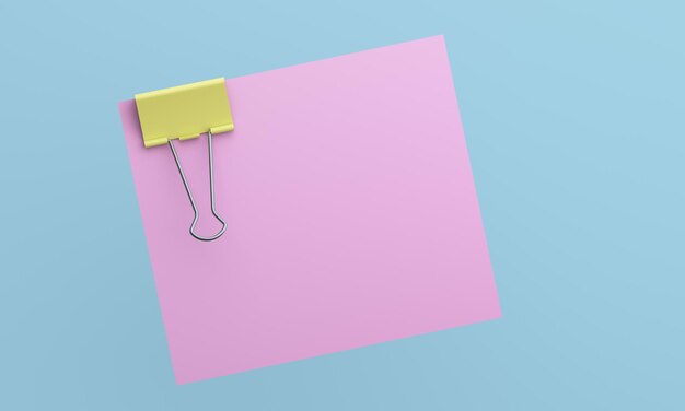 Photo paper and clip against blue background