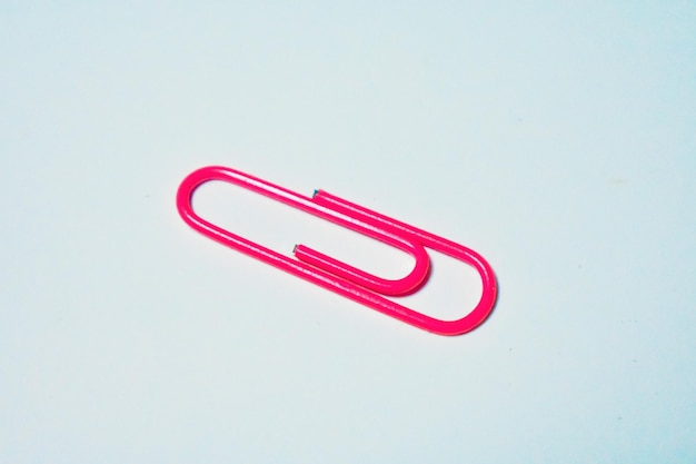 Photo paper clip against white background