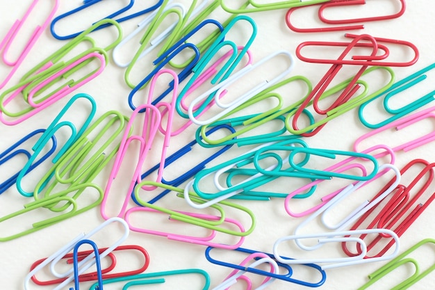 Paper clips colorful object on white color background