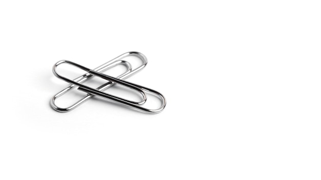 Paper clips on a white background. High quality photo