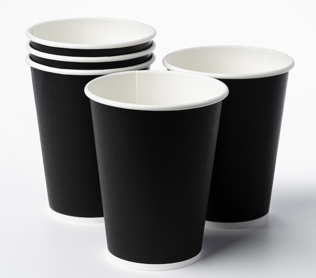 Paper coffee cups isolated. Close up.