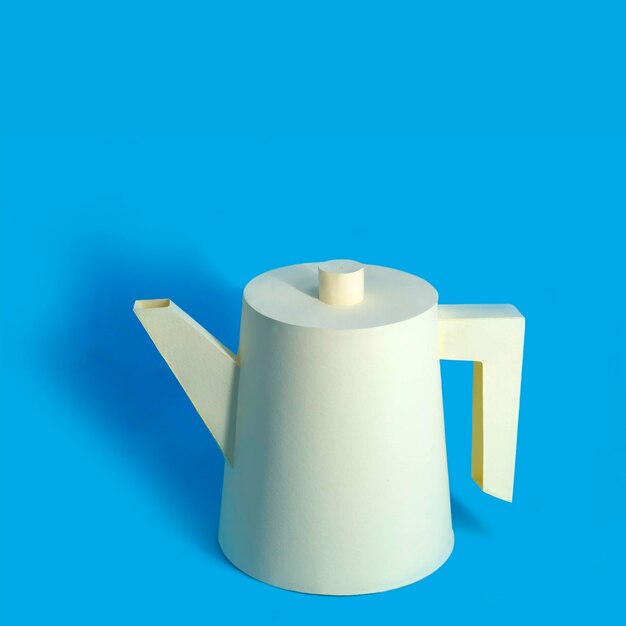 Paper coffee pot on blue background