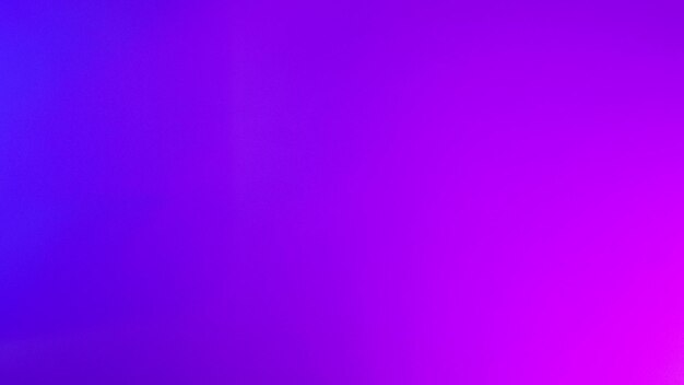 Paper colored with blue and purple light as an abstract background