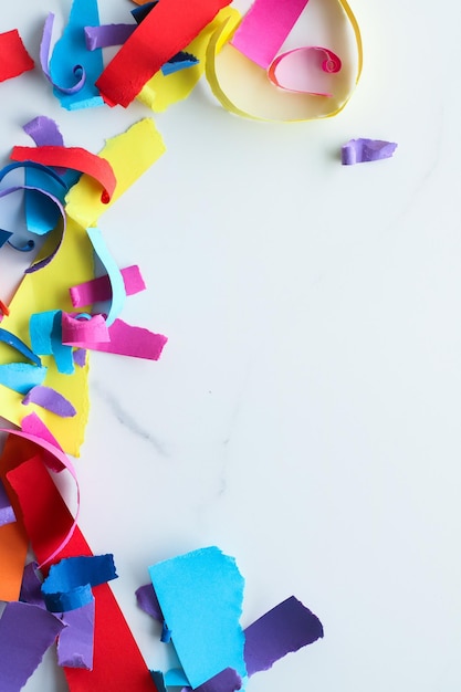 Paper confetti on marble flatlay background