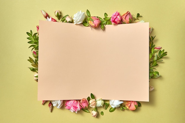 Paper congratulation card with flowers frame