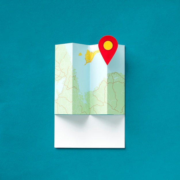 Photo paper craft art of a map with a pointer