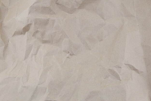 Photo paper crumpled texture background. brown paper background.