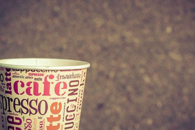 Paper cup of coffee closeup