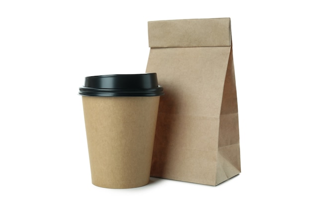 Photo paper cup and paper bag isolated on white surface