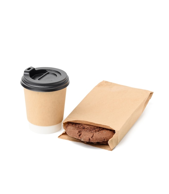 Paper cup and round chocolate chip cookies in narrow paper brown food bag isolated on white background, takeaway food