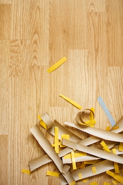 Paper cutting on the floor, top view