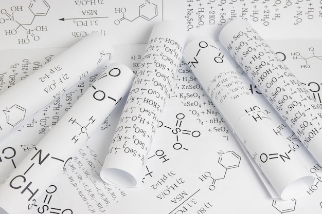Photo paper drawings of chemical formulas of elements