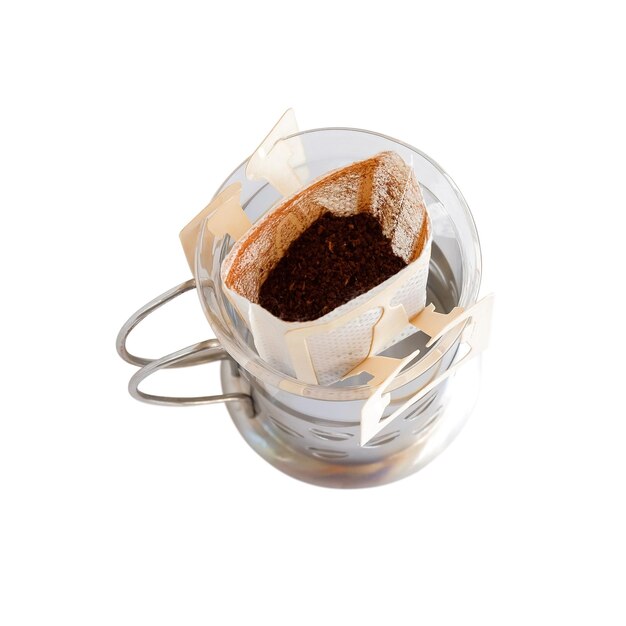 Photo paper drip or brewed bag of coffee on cupclipping path