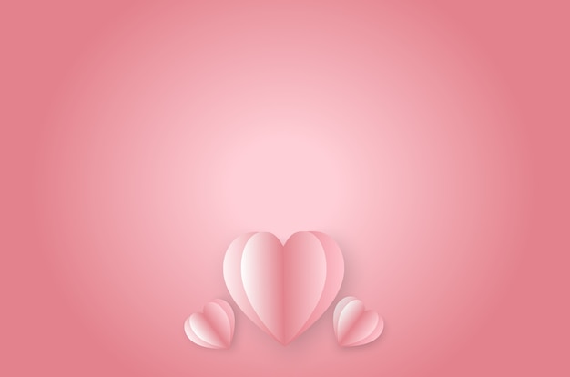 Paper elements in shape of heart on pink background