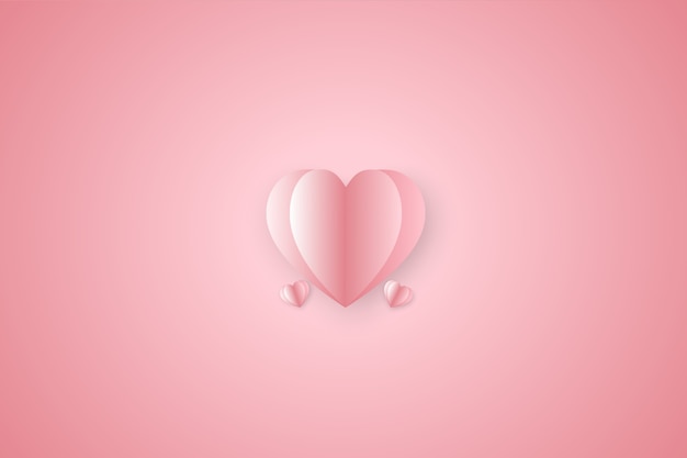 Paper elements in shape of heart on pink background