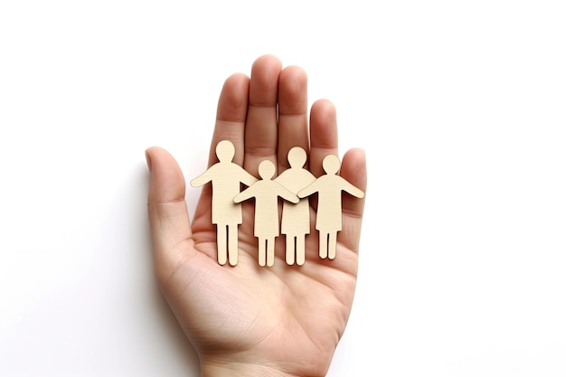 Paper family in hand isolated on white background Family insurance concept