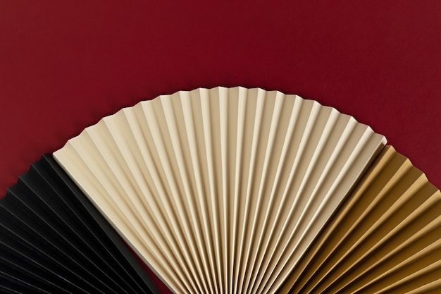 paper fans over red background, Chinese New Year