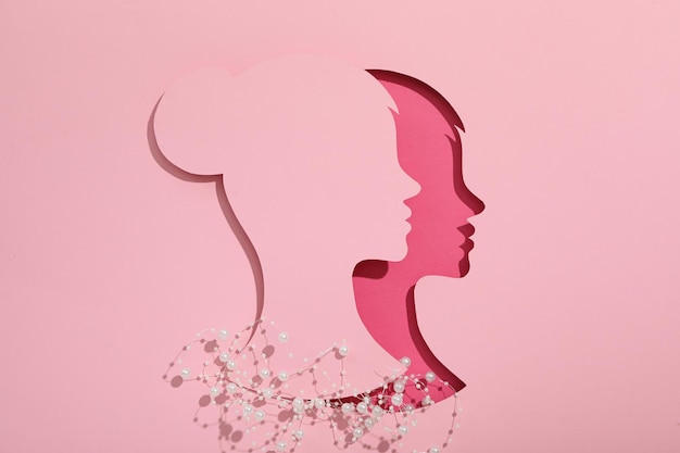 paper female head on a light background