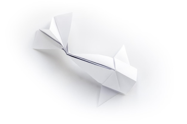 Paper fish origami isolated on a white background