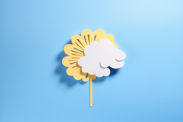 A paper flower with a cloud on a blue background